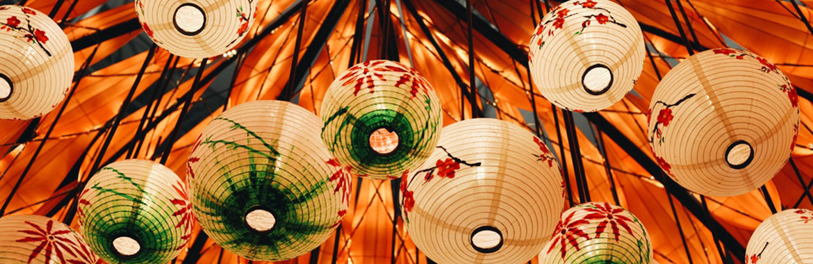 Oriental light lanterns hung from a ceiling