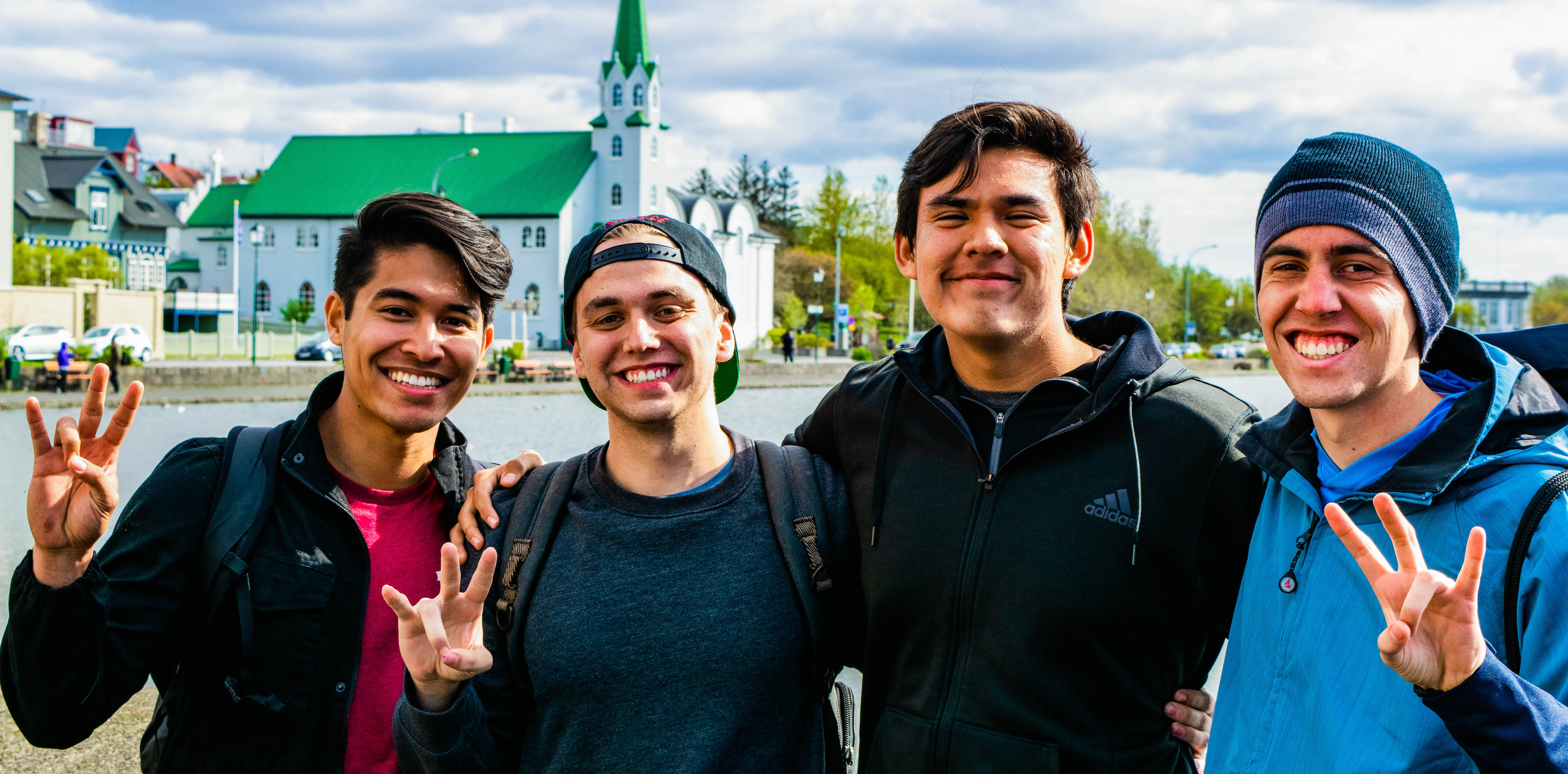 Four ASU students hold up pitchforks in Iceland