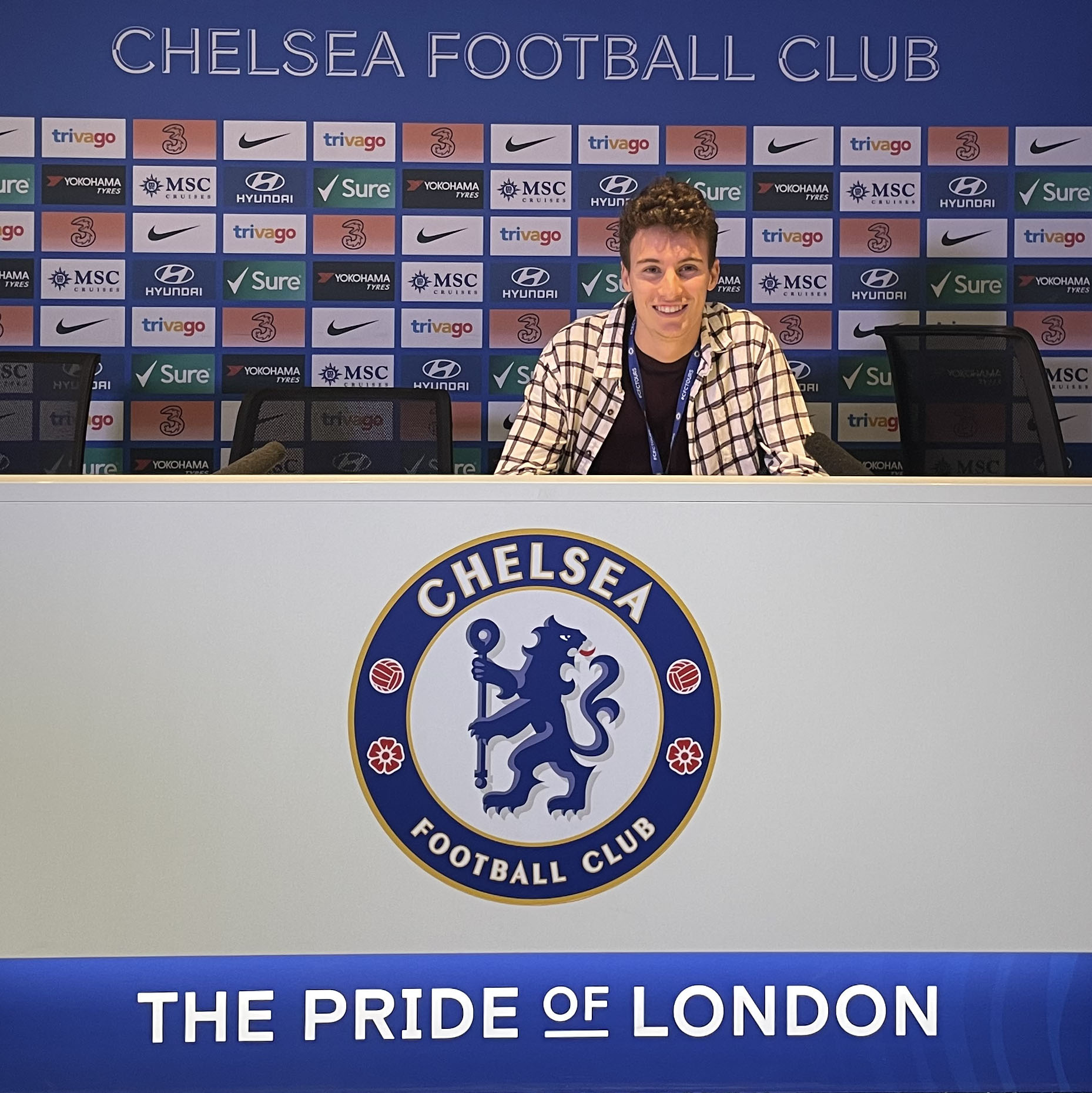 Eric Kozel sitting at the Chelsea Football Club press table