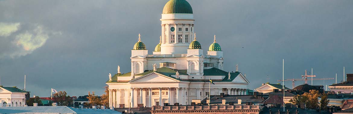 White building with a green roof