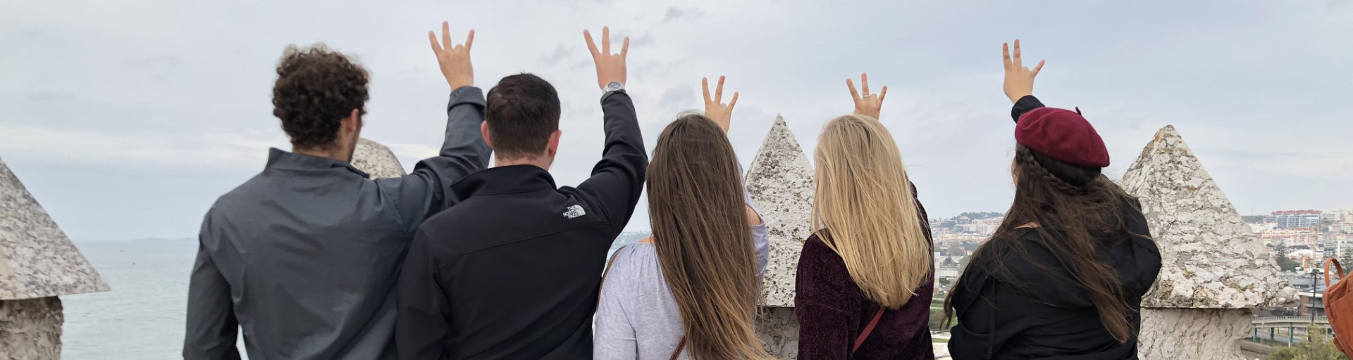 Students showing the forks up hand sign